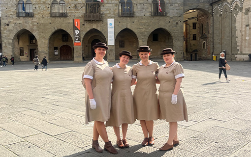 four Norland students in uniform in Pistoia, Italy