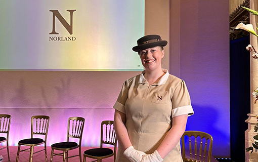 A female Norland Nanny at her graduation in Bath Abbey