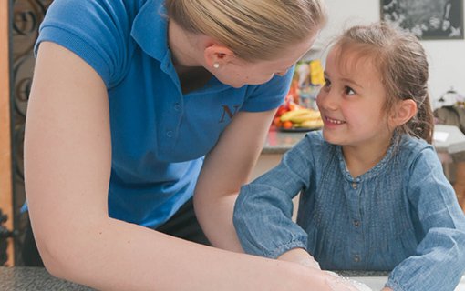 child and Norland nanny washing hands