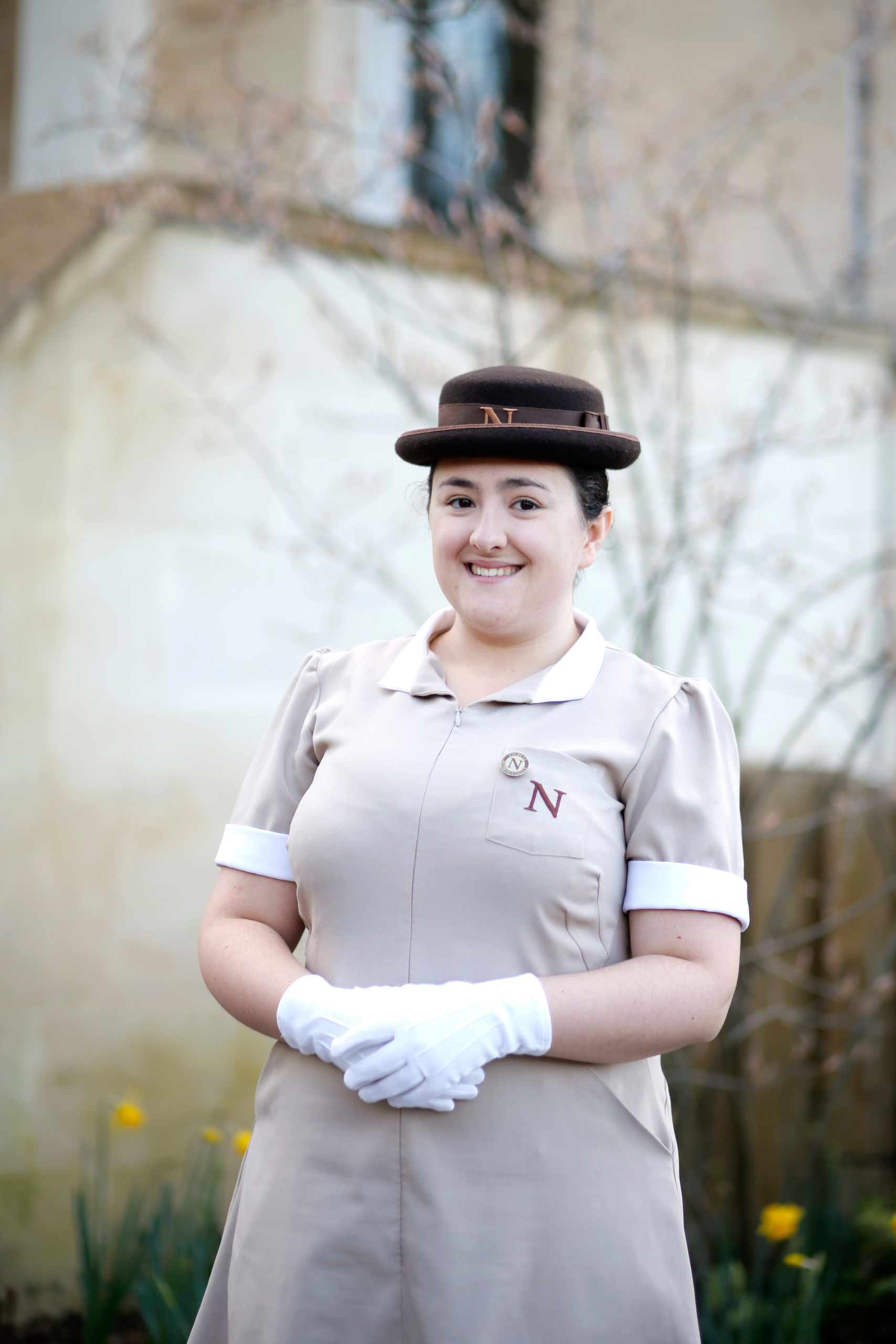 female headshot in Norland nanny uniform