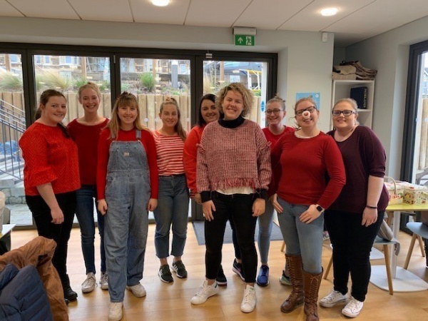 group of girls weaaring red