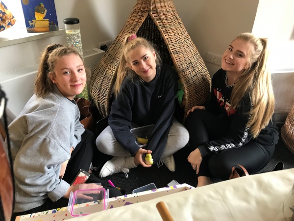 three female students in nursery